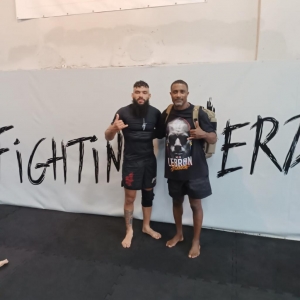 André com Flávio Álvaro MMA Coach,  no UFC. Foto: Divulgação.